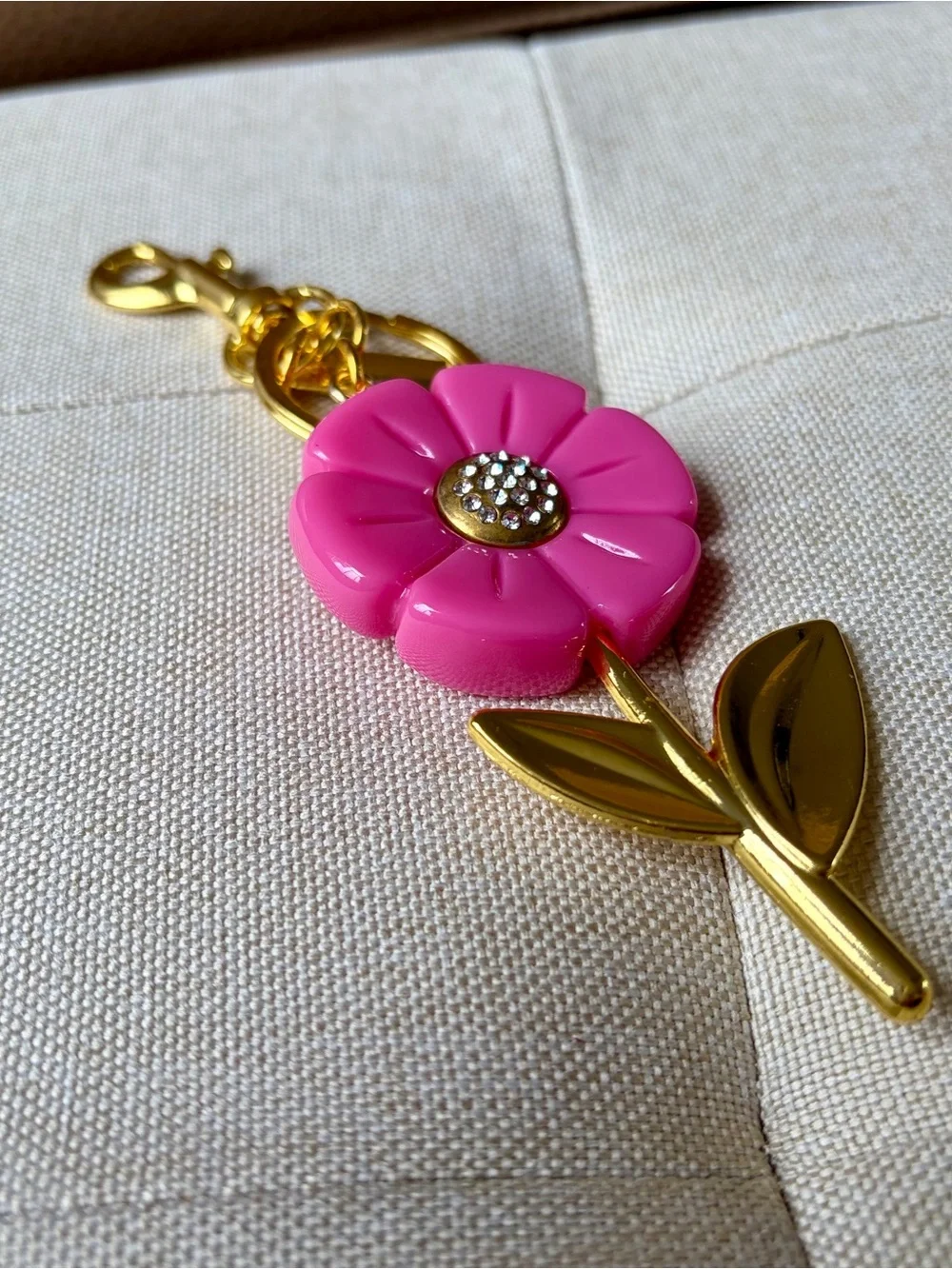 Stylish Pink Flower Keychain with Gold-Tone Stem